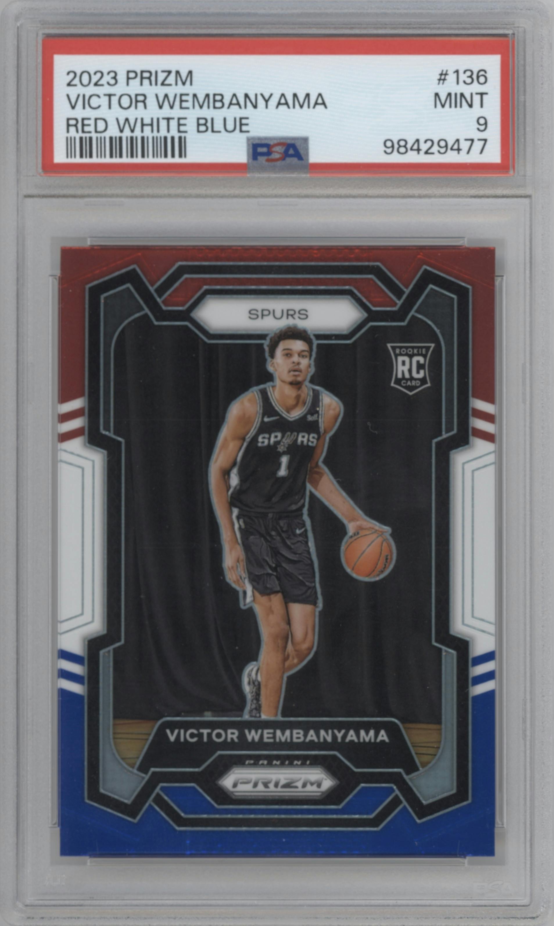 Victor Wembanyama from the 2023-24 Panini Prizm set featuring a Red White Blue Prizm parallel graded by PSA and given an overall grade of 9.