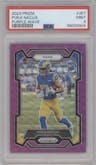 Puka Nacua from the 2023 Panini Prizm set featuring a Purple Wave parallel graded by PSA and given an overall grade of 9.