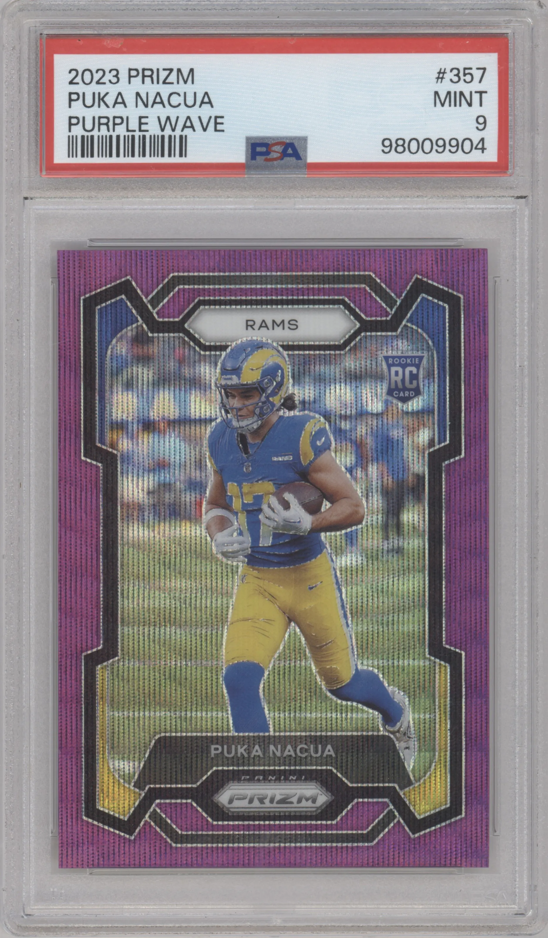 Puka Nacua from the 2023 Panini Prizm set featuring a Purple Wave parallel graded by PSA and given an overall grade of 9.