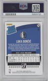 Luka Doncic from the 2018-19 Panini Donruss  set featuring a Green Laser parallel graded by PSA and given an overall grade of 8.