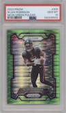 Bijan Robinson from the 2023 Panini Prizm set featuring a Neon Green Pulsar parallel graded by PSA and given an overall grade of 10.