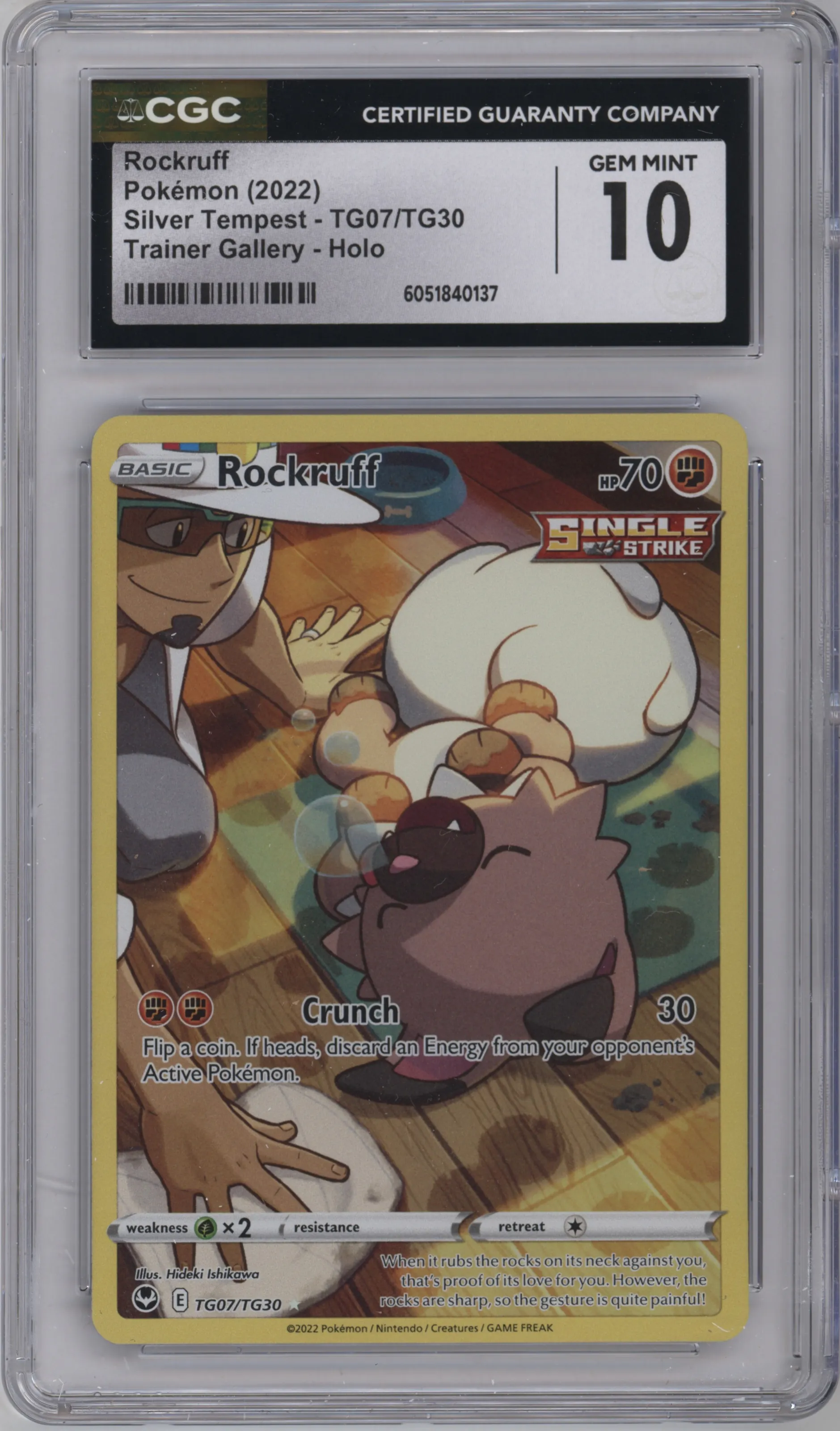 Rockruff from the 2022 Pokemon SWSH set graded by CSG and given an overall grade of 10.