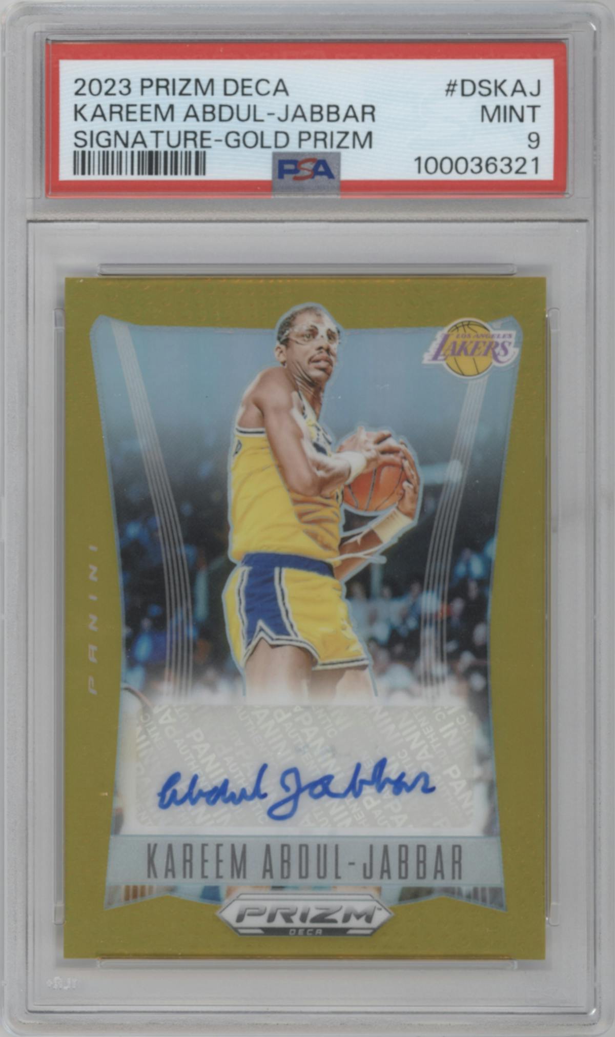 Kareem Abdul-Jabbar from the 2023-24 Panini Prizm Deca set featuring a Gold parallel graded by PSA and given an overall grade of 9.