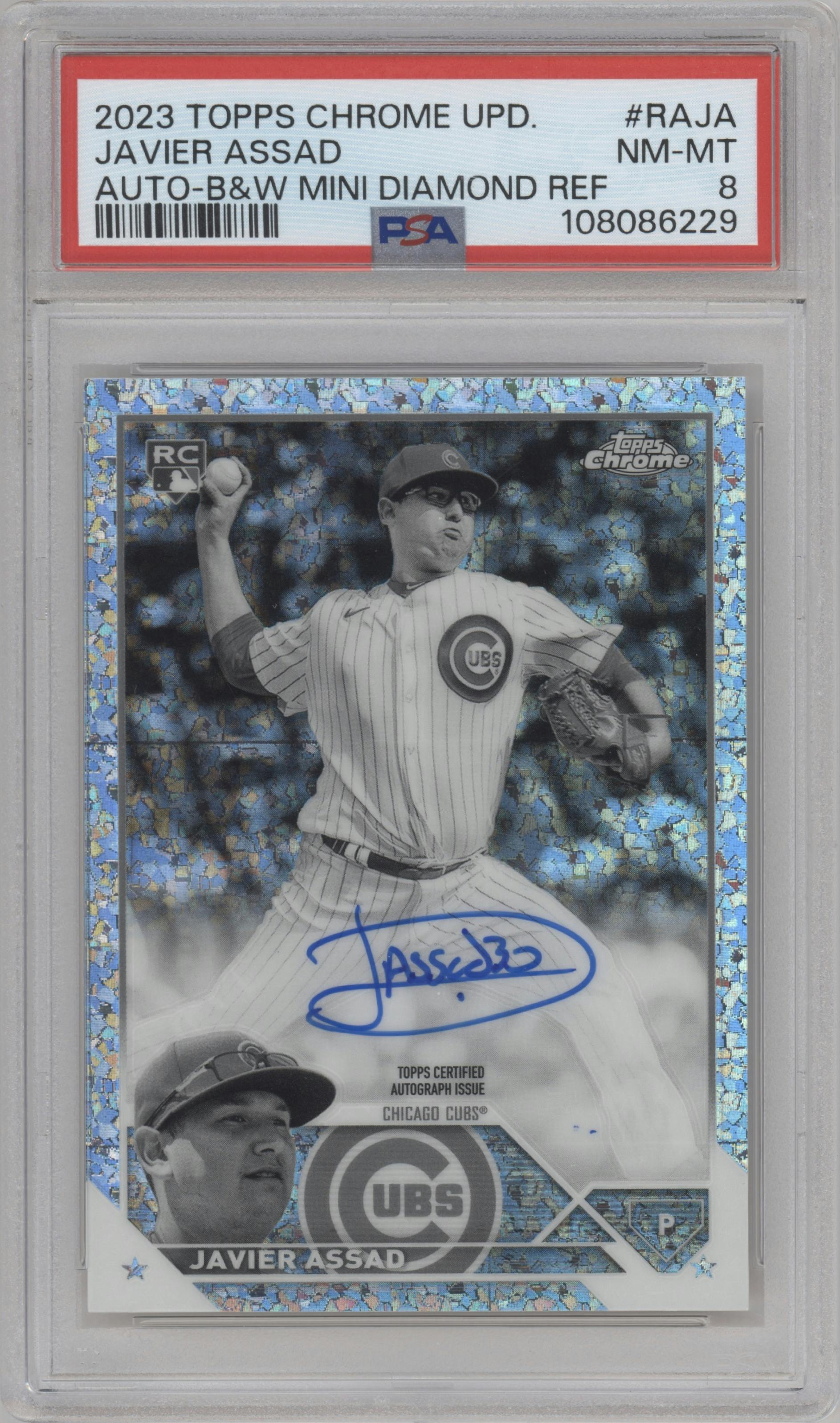 Javier Assad from the 2023 Topps Chrome Update set featuring a B&W Mini Diamond Refractor parallel graded by PSA and given an overall grade of 8.