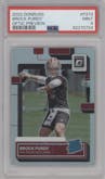 Brock Purdy from the 2022 Panini Donruss set featuring a Holo parallel graded by PSA and given an overall grade of 9.