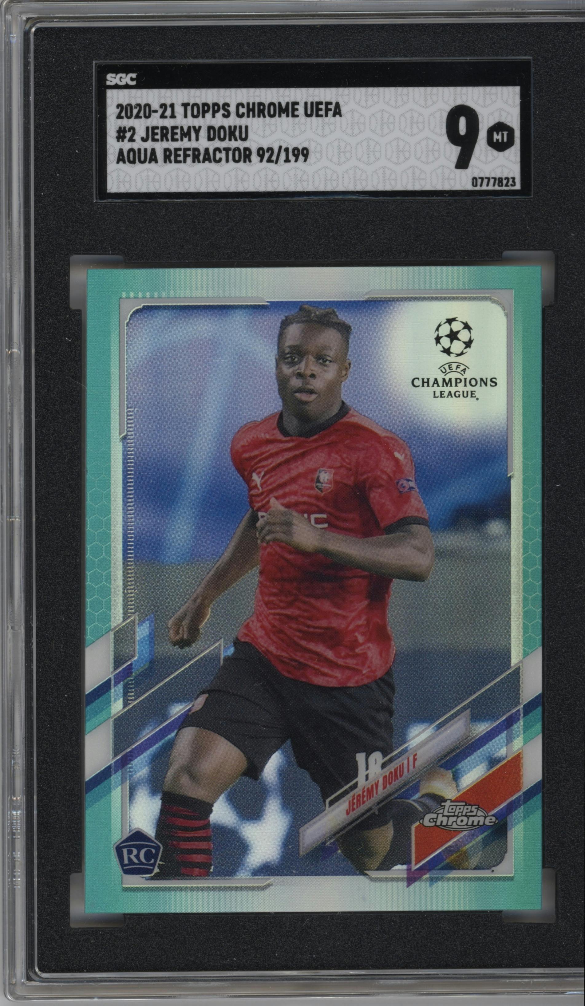 Jeremy Doku from the 2020-21 Topps Chrome UEFA Champions League set featuring a Aqua Refractor parallel graded by SGC and given an overall grade of 9.