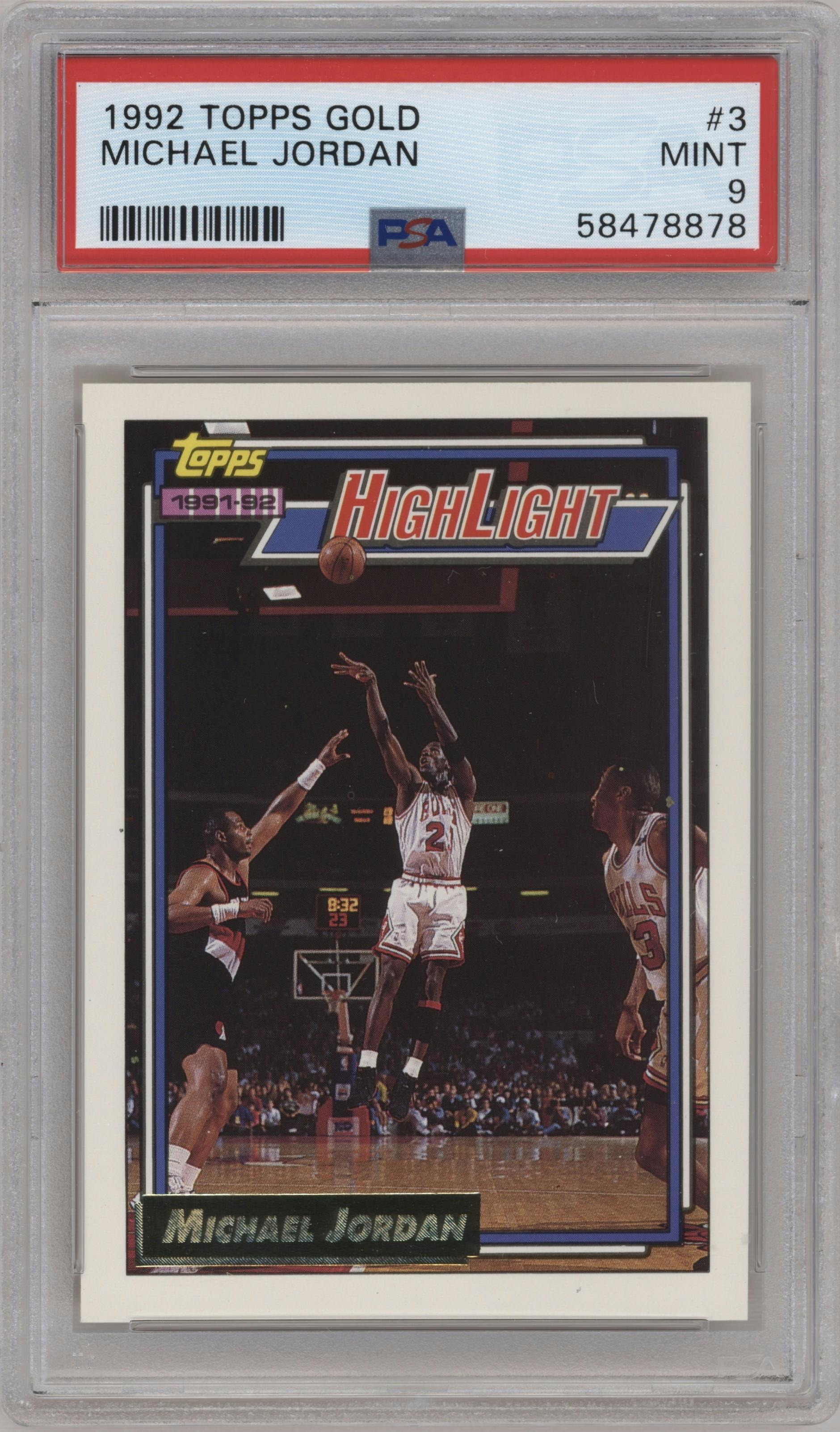 Michael Jordan from the 1992-93 Topps set featuring a Gold parallel graded by PSA and given an overall grade of 9.