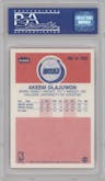 Akeem Olajuwon from the 1986-87 Fleer set graded by PSA and given an overall grade of 6.