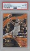 Devin Booker from the 2023-24 Panini Select  set featuring a Neon Orange Pulsar parallel graded by PSA and given an overall grade of 10.