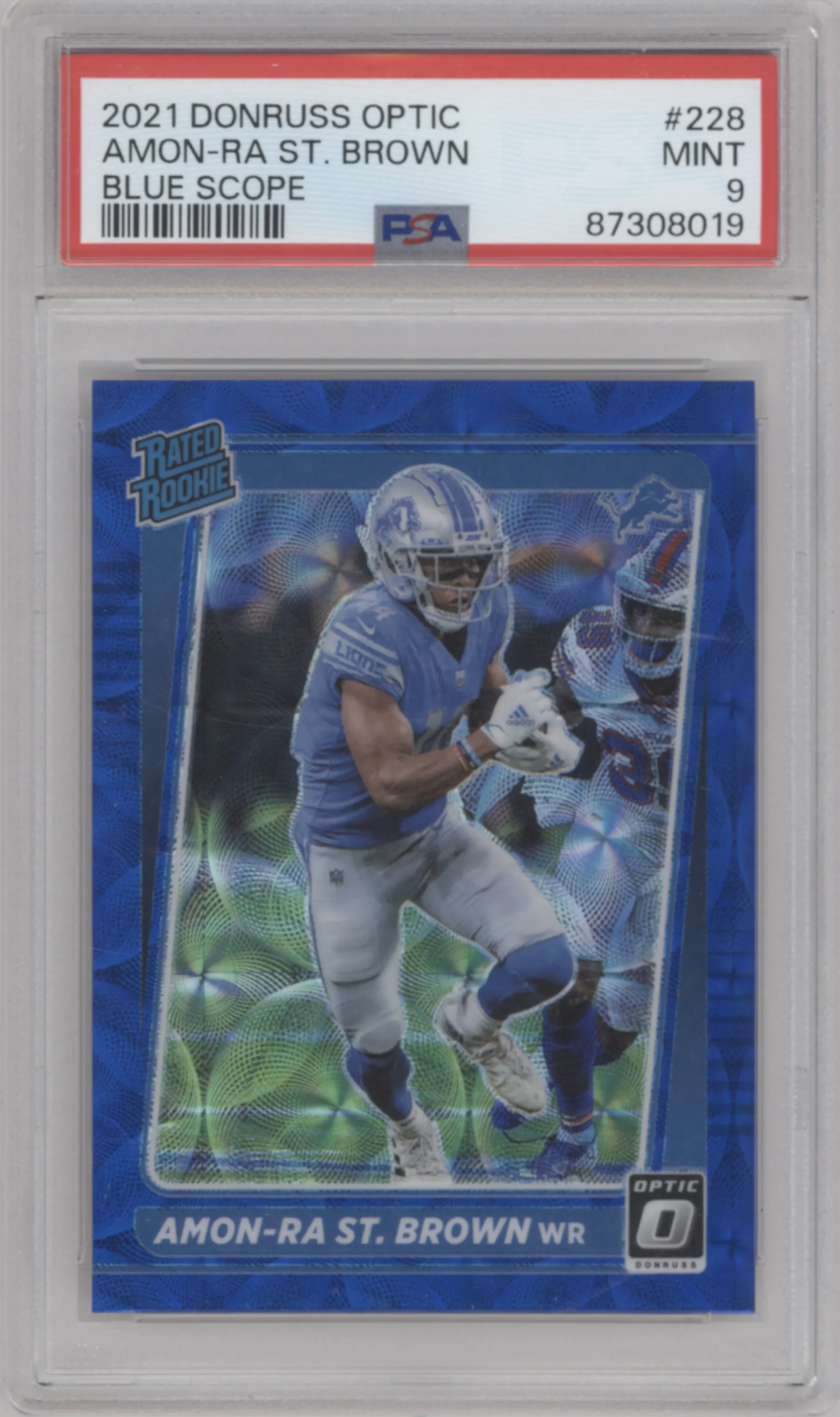Amon-Ra St. Brown from the 2021 Panini Donruss Optic set featuring a Blue Scope parallel graded by PSA and given an overall grade of 9.