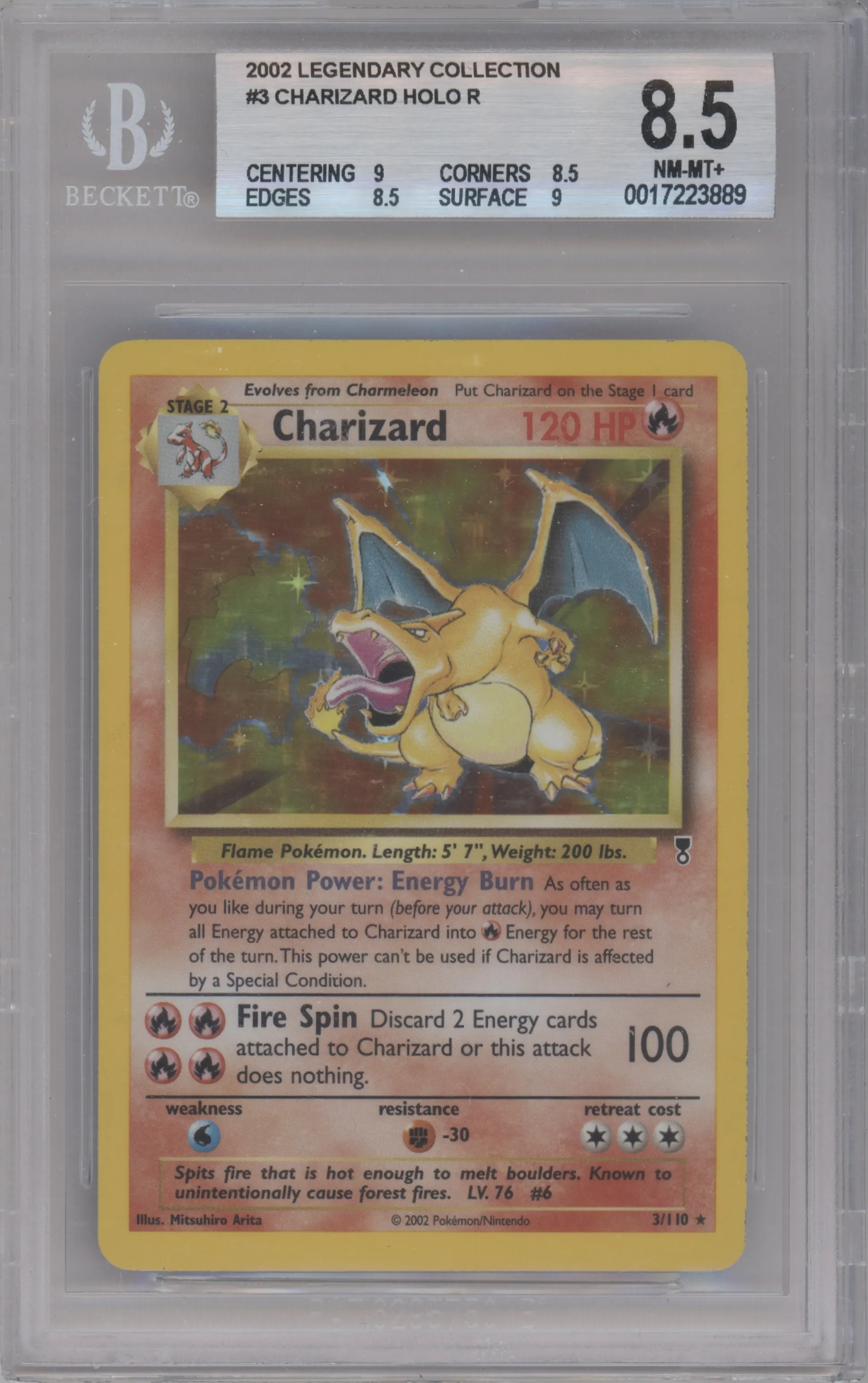 Charizard from the 2002 Pokemon  set graded by Beckett and given an overall grade of 8.5.