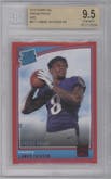 Lamar Jackson from the 2018 Panini Donruss set featuring a Press Proof Red parallel graded by Beckett and given an overall grade of 9.5.