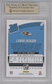 Lamar Jackson from the 2018 Panini Donruss set featuring a Press Proof Red parallel graded by Beckett and given an overall grade of 9.5.