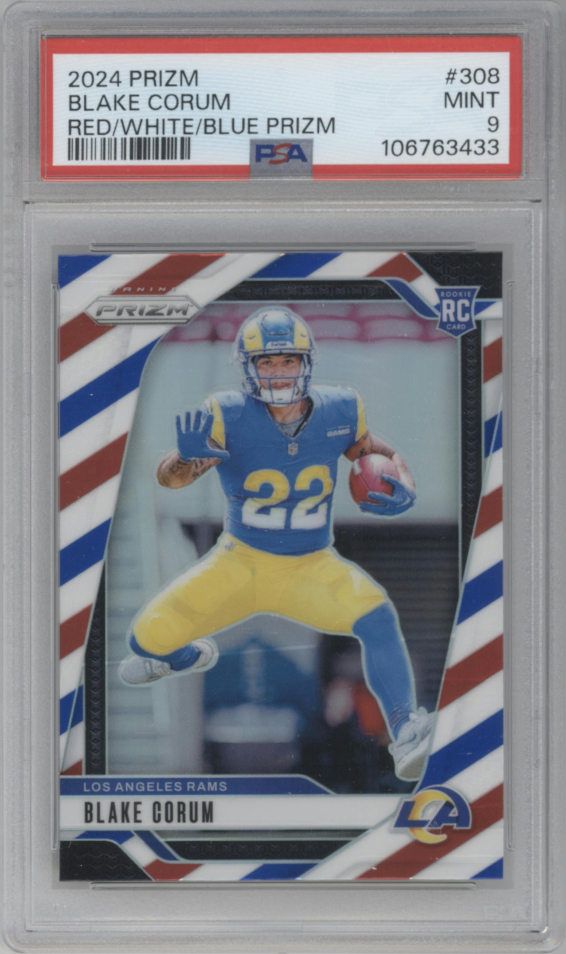 Blake Corum from the 2024 Panini Prizm set featuring a Red/White/Blue Prizm parallel graded by PSA and given an overall grade of 9.