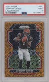 Ja'Marr Chase from the 2021 Panini Prizm set featuring a Lazer parallel graded by PSA and given an overall grade of 9.