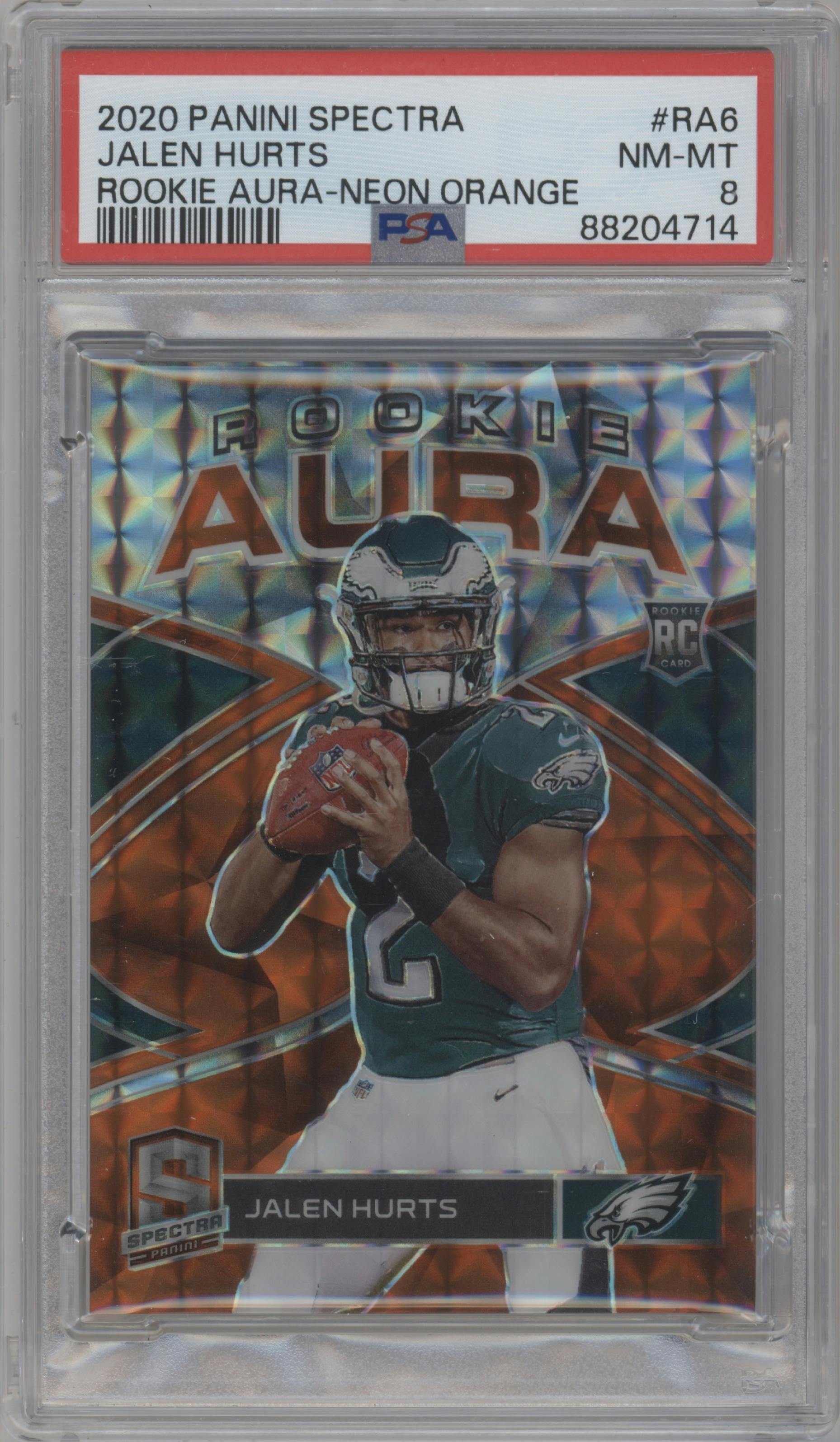 Jalen Hurts from the 2020 Panini Spectra set featuring a Neon Orange parallel graded by PSA and given an overall grade of 8.