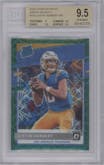 Justin Herbert from the 2020 Panini Donruss Optic set featuring a Green Velocity parallel graded by Beckett and given an overall grade of 9.5.