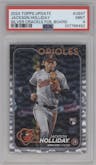 Jackson Holliday from the 2024 Topps Update set featuring a Silver Crackle Foilboard parallel graded by PSA and given an overall grade of 9.