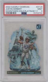 Justin Herbert  from the 2022 Clearly Donruss set featuring a Holo Platinum  parallel graded by PSA and given an overall grade of 9.