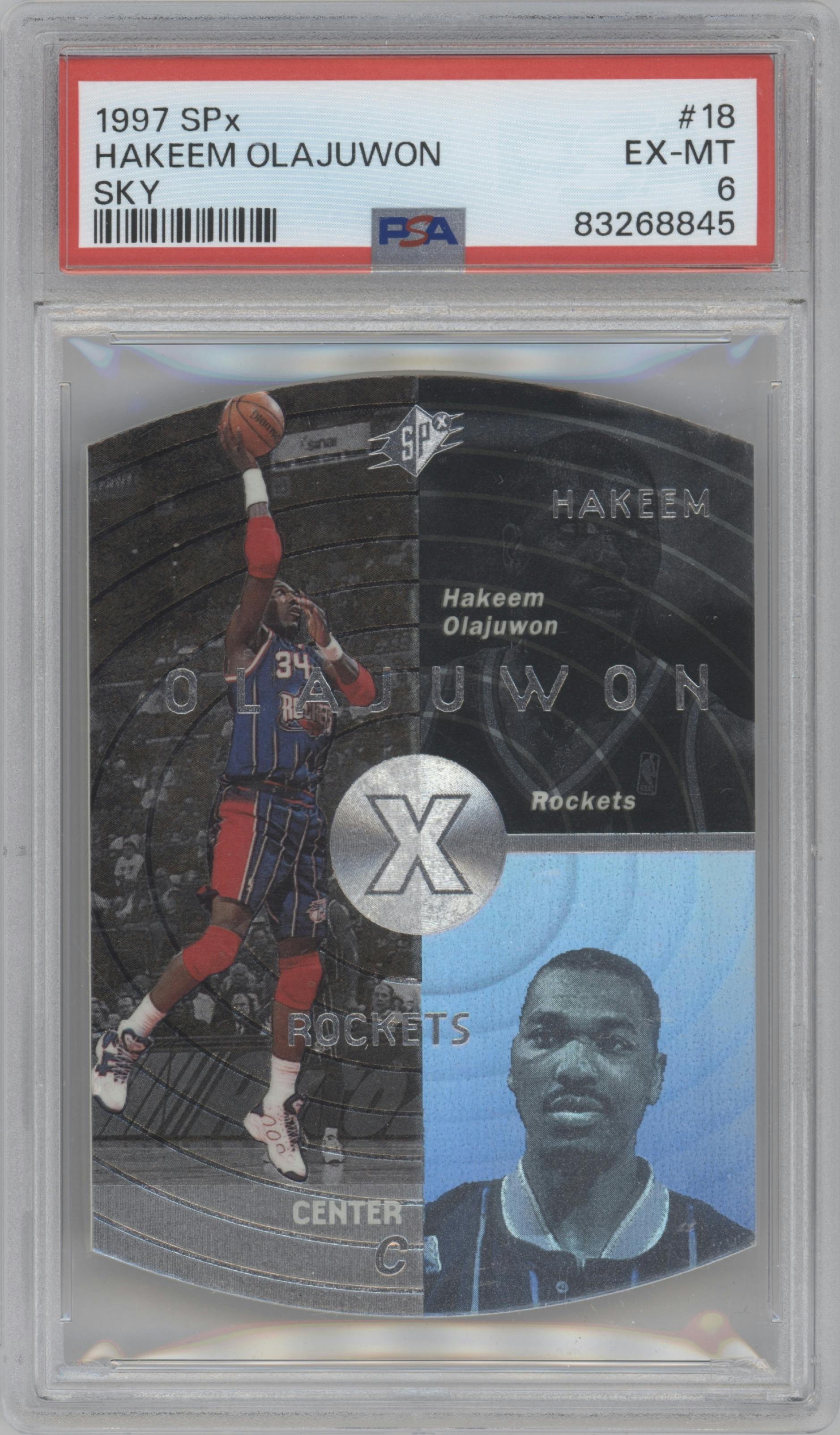Hakeem Olajuwon from the 1997-98 SPx set featuring a Sky parallel graded by PSA and given an overall grade of 6.