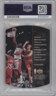 Hakeem Olajuwon from the 1997-98 SPx set featuring a Sky parallel graded by PSA and given an overall grade of 6.