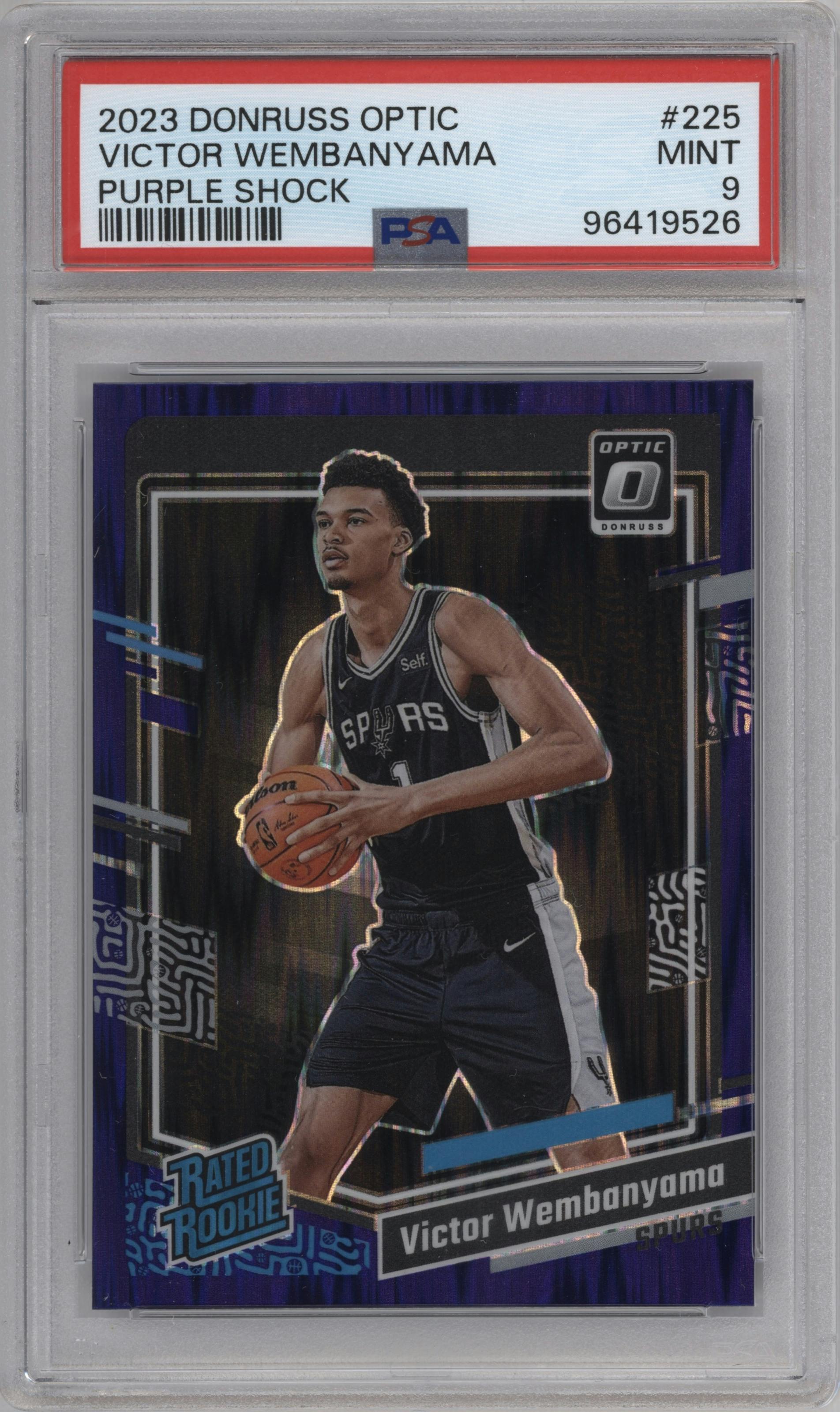 Victor Wembanyama from the 2023-24 Donruss Optic set featuring a Purple Shock parallel graded by PSA and given an overall grade of 9.