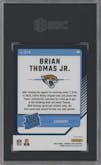 Brian Thomas Jr. from the 2024 Donruss Optic set featuring a Holo parallel graded by SGC and given an overall grade of 9.5.