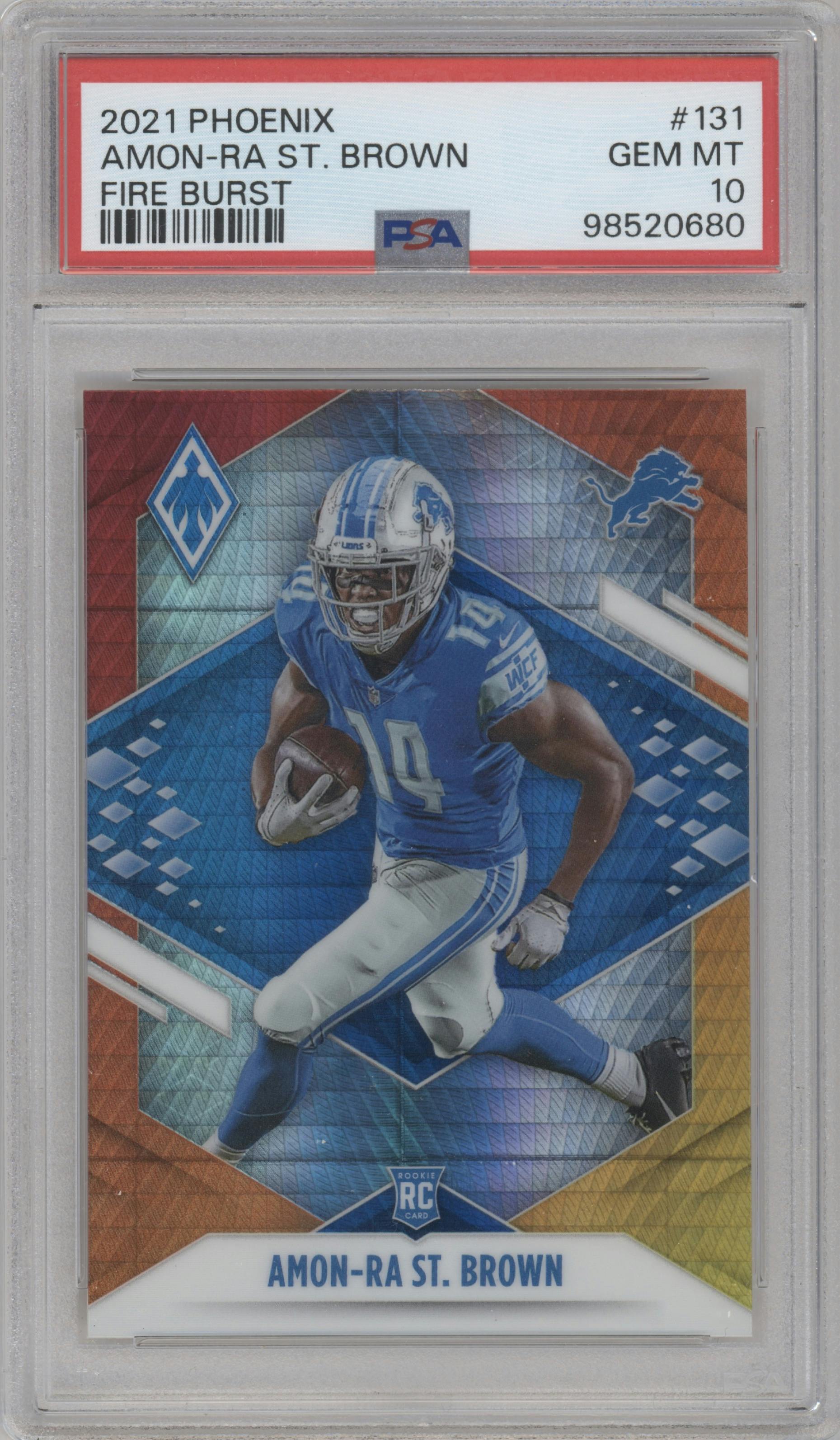 Amon-Ra St. Brown from the 2021 Panini Phoenix set featuring a Fire Burst parallel graded by PSA and given an overall grade of 10.