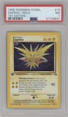 Zapdos from the 1999 Pokemon set graded by PSA and given an overall grade of 7.