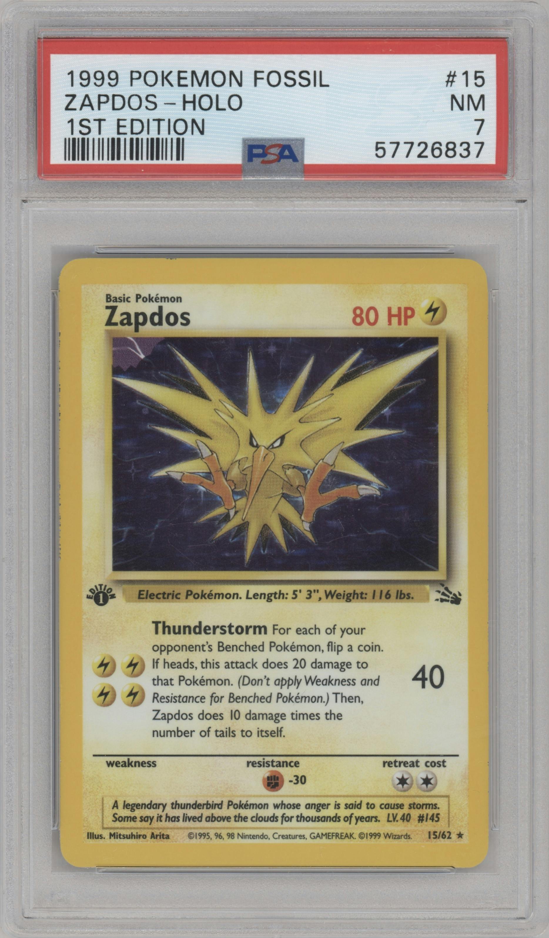 Zapdos from the 1999 Pokemon set graded by PSA and given an overall grade of 7.