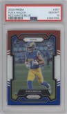 Puka Nacua from the 2023 Panini Prizm set featuring a Red/White/Blue parallel graded by PSA and given an overall grade of 10.