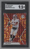 Tom Brady from the 2020 Panini Mosaic set featuring a Reactive Orange parallel graded by SGC and given an overall grade of 9.5.