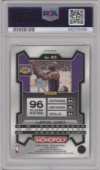 LeBron James from the 2023-24 Panini Prizm Monopoly set featuring a Purple  parallel graded by PSA and given an overall grade of 8.