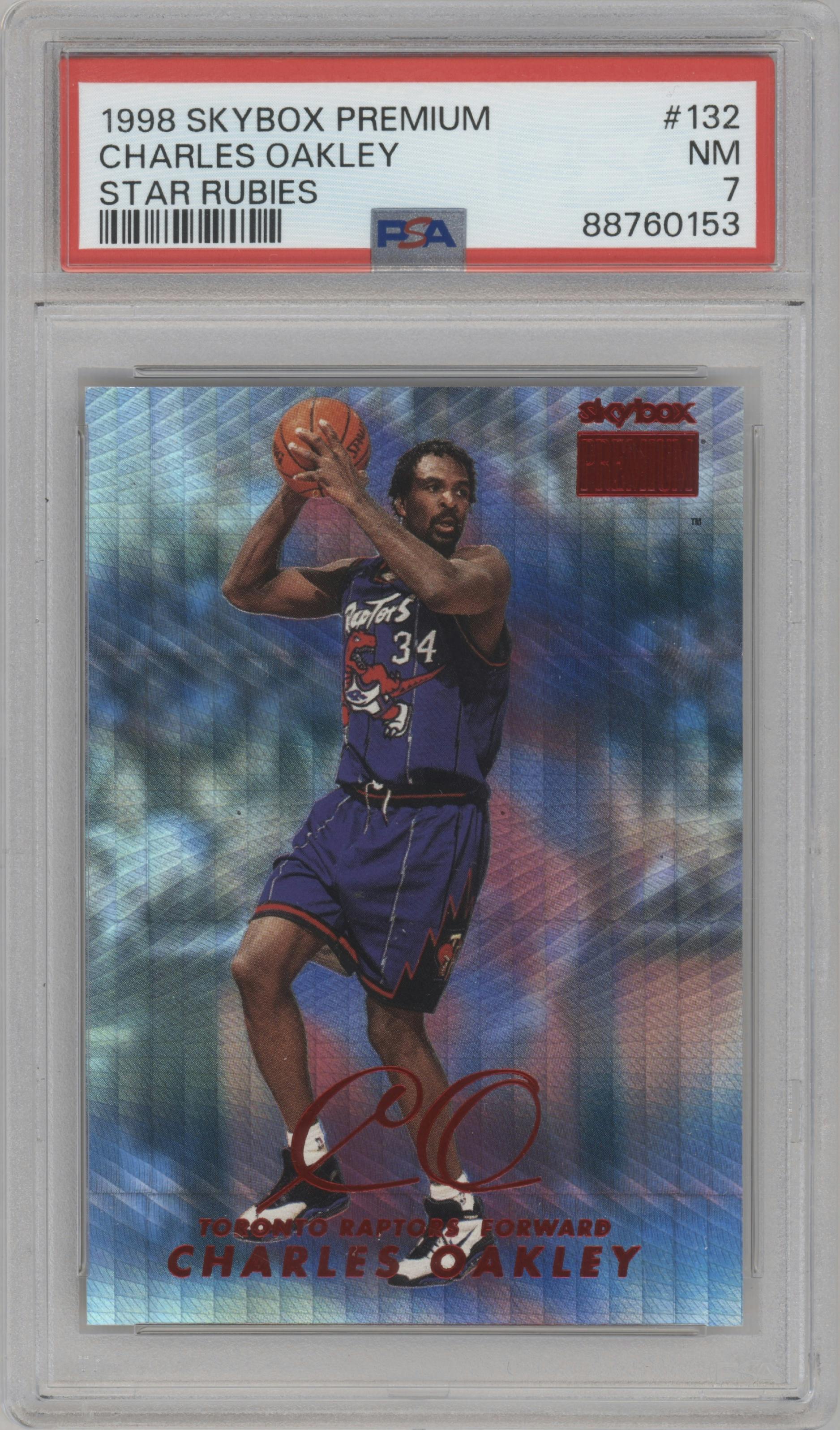 Charles Oakley from the 1998-99 Skybox Premium set featuring a Star Rubies parallel graded by PSA and given an overall grade of 7.