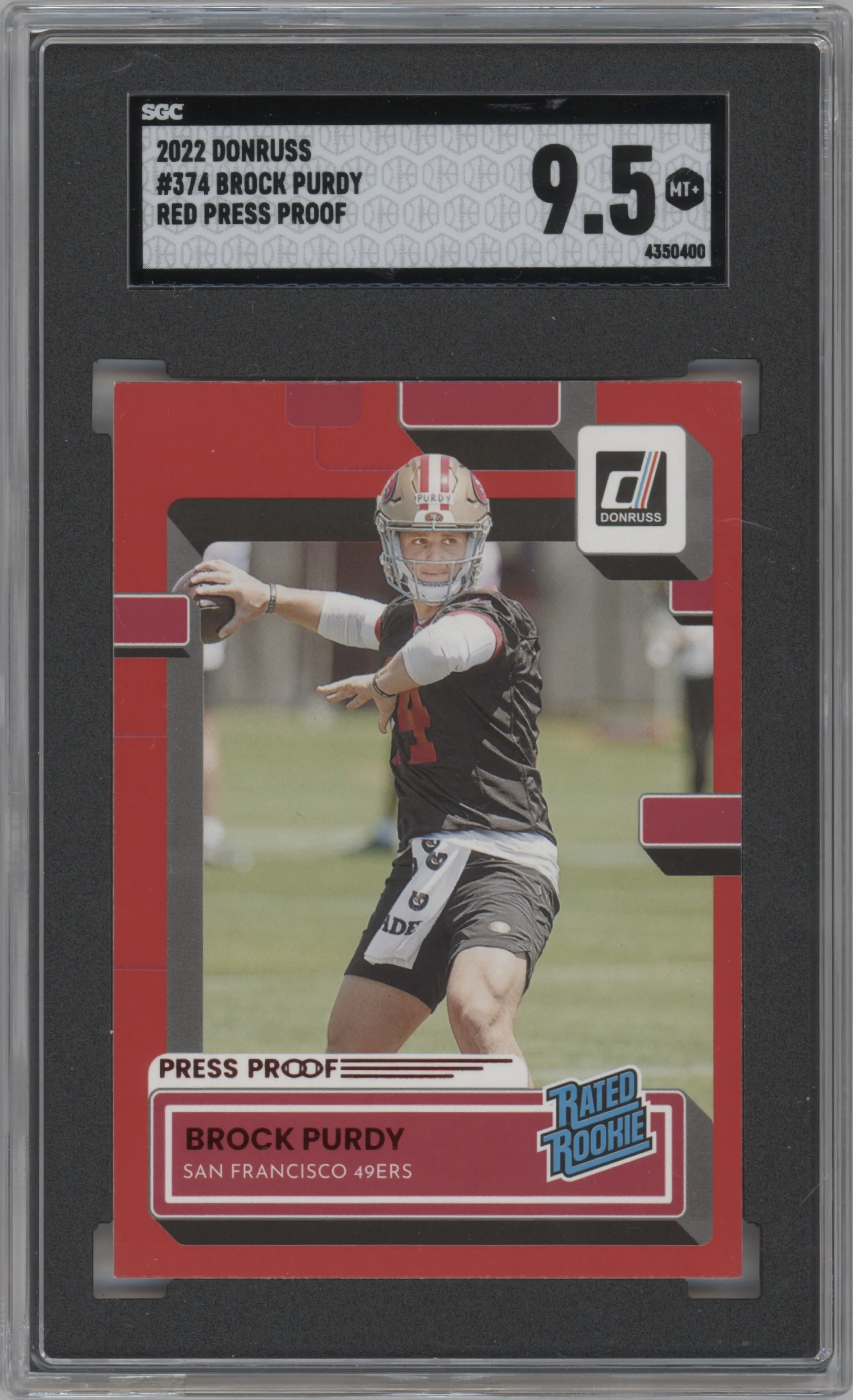 Brock Purdy from the 2022 Panini Donruss set featuring a Press Proof Red parallel graded by SGC and given an overall grade of 9.5.