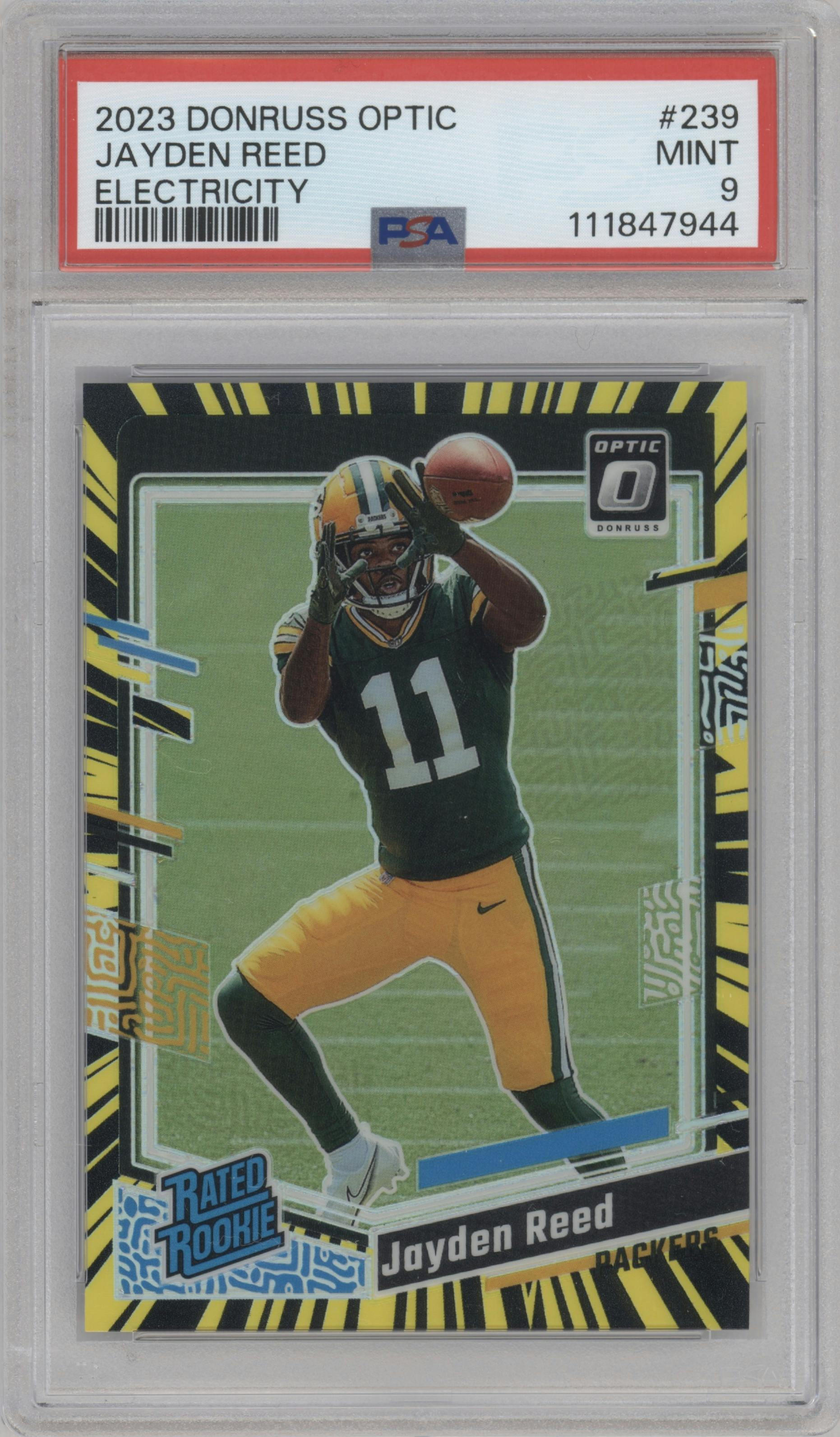 Jayden Reed from the 2023 Donruss Optic set featuring a Electricity parallel graded by PSA and given an overall grade of 9.