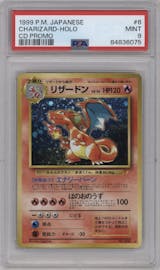 Charizard from the 1999 Pokemon JPN set featuring a CD Promo parallel graded by PSA and given an overall grade of 9.