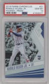 Ronald Acuna Jr. from the 2018 Panini Chronicles set featuring a Prizm parallel graded by PSA and given an overall grade of 10.