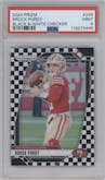 Brock Purdy from the 2024 Panini Prizm set featuring a Black & White Checker parallel graded by PSA and given an overall grade of 9.