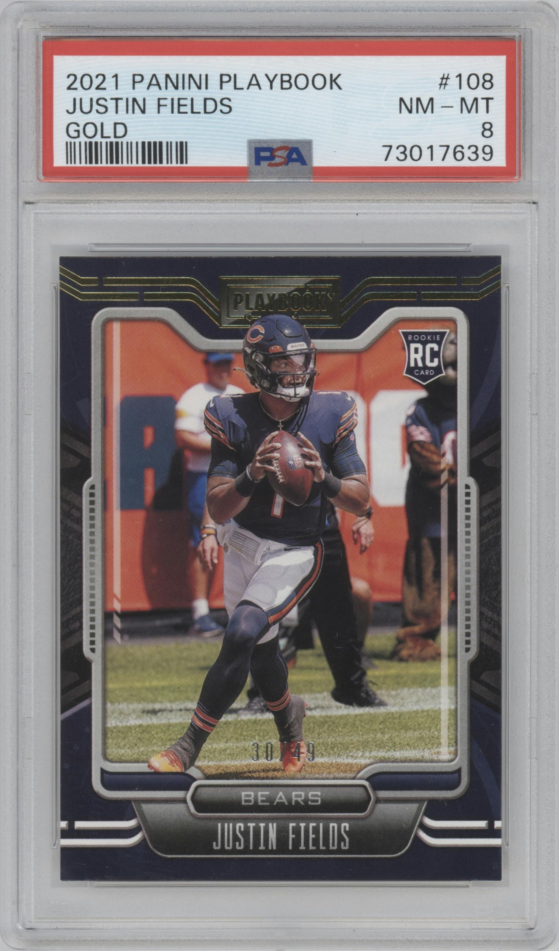 Justin Fields from the 2021 Panini Playbook set featuring a Gold parallel graded by PSA and given an overall grade of 8.