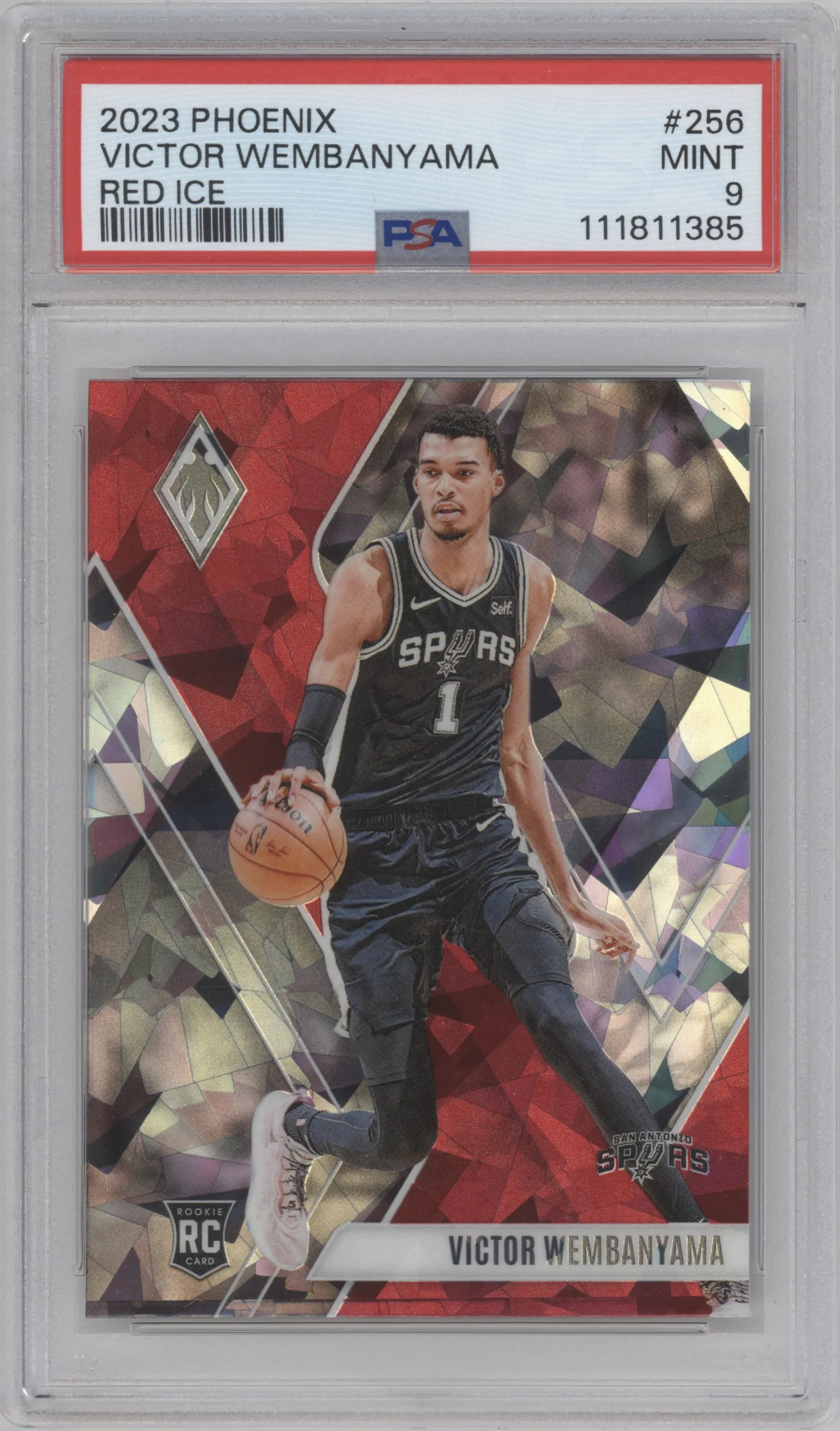 Victor Wembanyama from the 2023-24 Panini Phoenix set featuring a Red Ice parallel graded by PSA and given an overall grade of 9.
