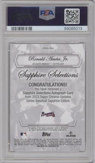 Ronald Acuna Jr. from the 2023 Topps Chrome Update Series Sapphire Edition set featuring a Red parallel graded by PSA and given an overall grade of 10.