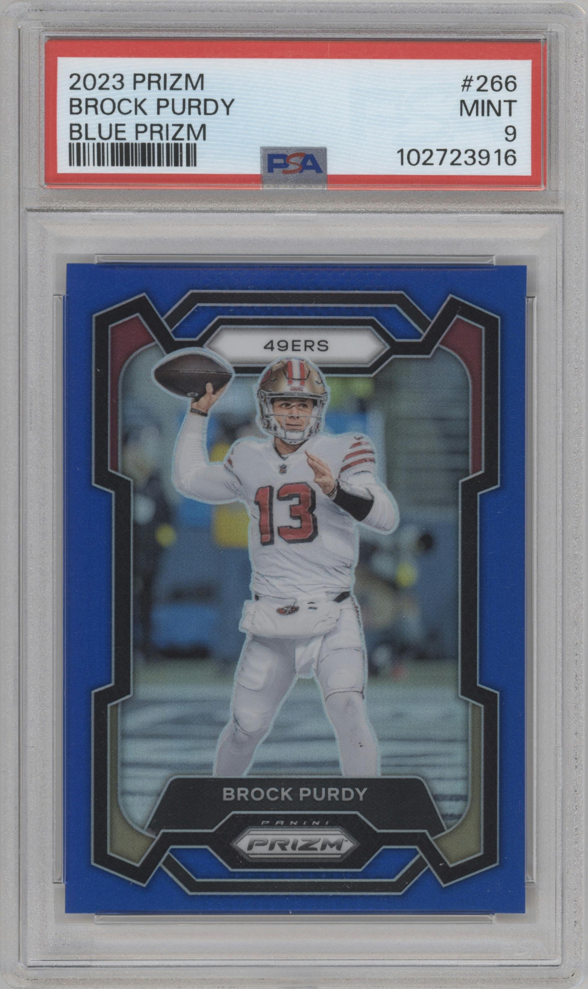 Brock Purdy from the 2023 Panini Prizm set featuring a Blue Prizm parallel graded by PSA and given an overall grade of 9.