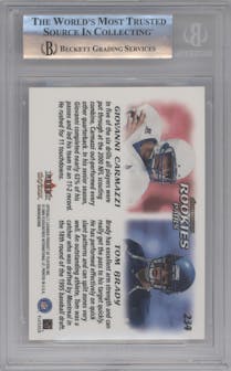 Giovanni Carmazzi/Tom Brady from the 2000 Skybox Dominion set graded by Beckett and given an overall grade of 9.