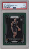 Victor Wembanyama from the 2023-24 Panini Prizm set featuring a Green Prizm parallel graded by PSA and given an overall grade of 9.