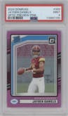 Jayden Daniels from the 2024 Donruss set featuring a Pink parallel graded by PSA and given an overall grade of 9.