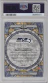 Zach Charbonnet from the 2023 Panini Mosaic set graded by PSA and given an overall grade of 10.