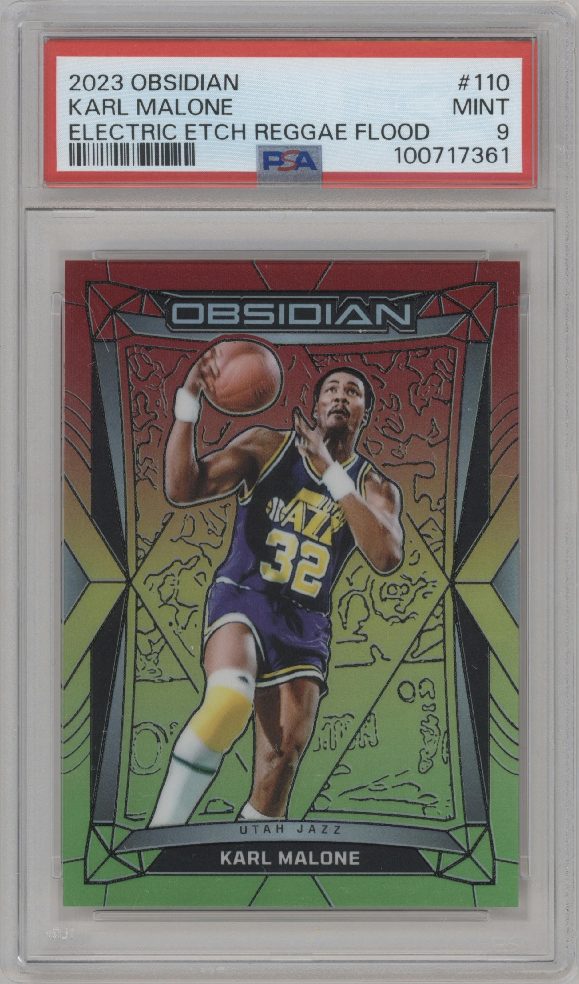 Karl Malone from the 2023-24 Panini Obsidian set featuring a Electric Etch Reggae Flood parallel graded by PSA and given an overall grade of 9.