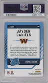 Jayden Daniels from the 2024 Donruss set featuring a Pink parallel graded by PSA and given an overall grade of 9.