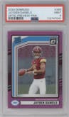 Jayden Daniels from the 2024 Donruss set featuring a Pink parallel graded by PSA and given an overall grade of 9.